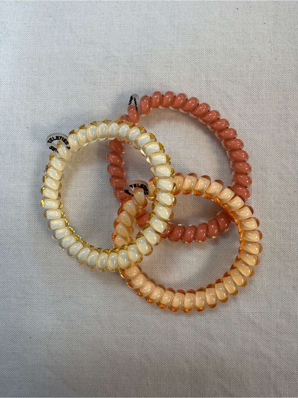 NWOT Teities Stretch Coiled Hair Ties - Set of 3 in Peach, Yellow & Coral